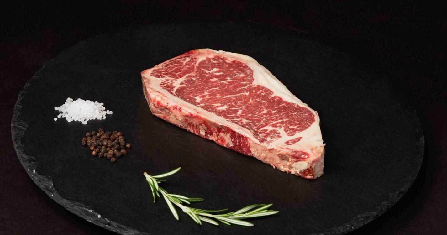 Beef Upper 1/3 Choice Angus Dry Aged Bone In NY Strip